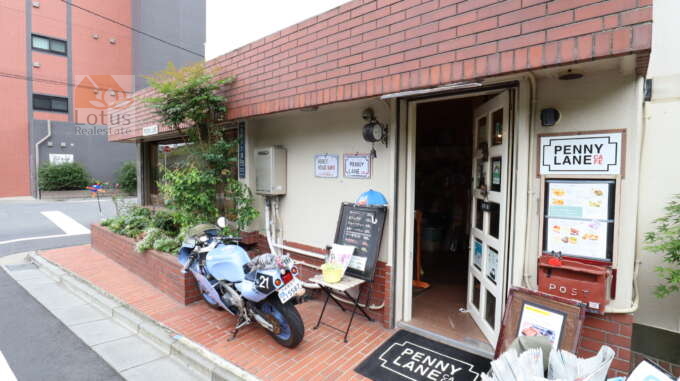 レック亀戸グリーンマンション外観｜１階部分はカフェ「