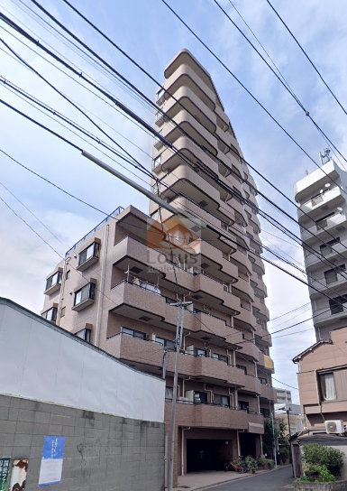 ニッセイパレス上池袋は、全体が落ち着いたブラウン系のタイル貼りで構成され、立体感あるフォルムが特徴的です。地上12階建てのスリムな縦型デザインです。