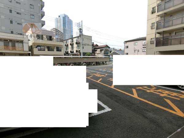 中野本町マンション外観共用部12｜駐車場は建物の裏手に設置されています。