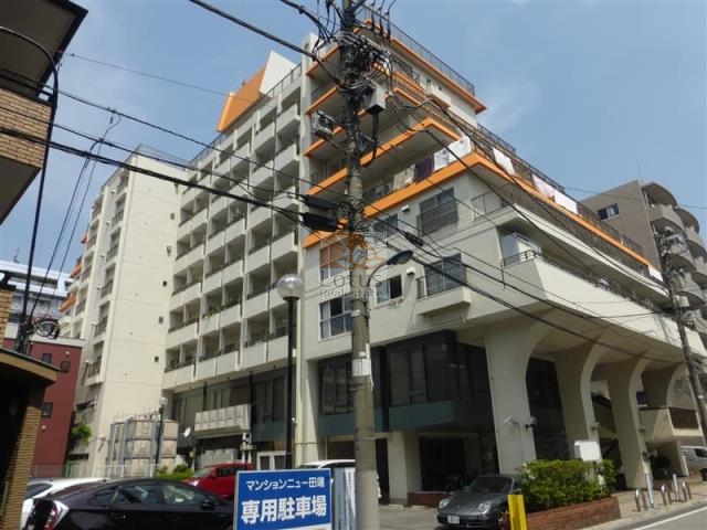 マンションニュー田端3｜マンションニュー田端の外観写真。植栽や外壁の様子が確認できます。