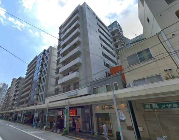 グローリア後楽園外観｜グローリア後楽園は１１階建て、商店街に面したマンションです。「春日」駅から徒歩３分、「後楽園」駅徒歩４分の好立地です。