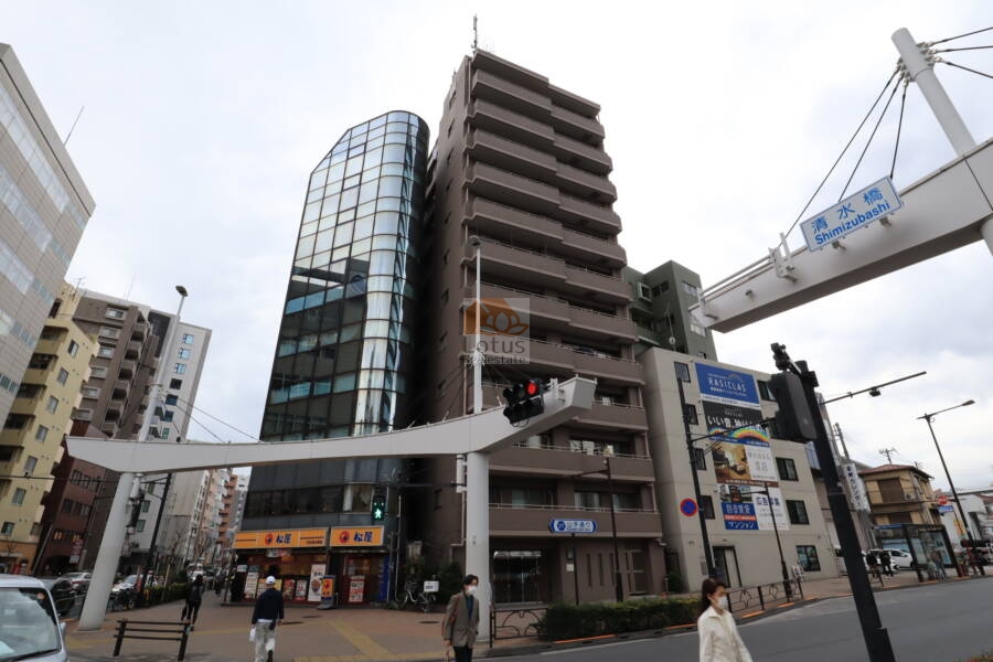 エクセルシオール西新宿外観1｜エクセルシオール西新宿は、東京都新宿区本町3丁目に位置しています。山手通りと方南通りが交差する、清水橋交差点の近くにあります。