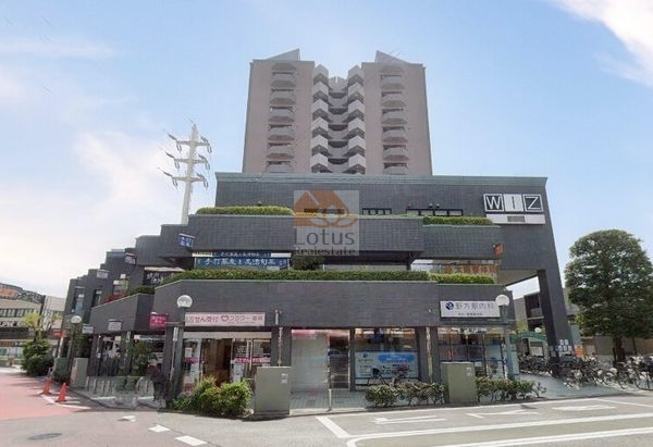 野方ウィズアクシス外観２｜マンション内には中野区民ホール、郵便局、飲食店などが入っています。
