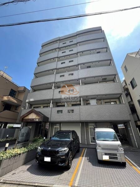 アメニティ大塚外観１｜アメニティ大塚は、平成6年築、7階建てのタイル貼りのファサードが整然とした印象を与えます。
